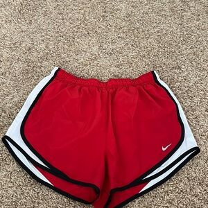 Red and black Nike dri-fit shorts